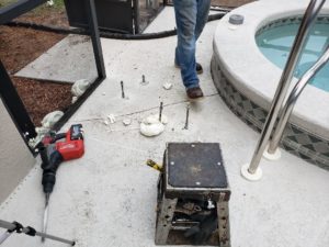 A pool deck being repaired